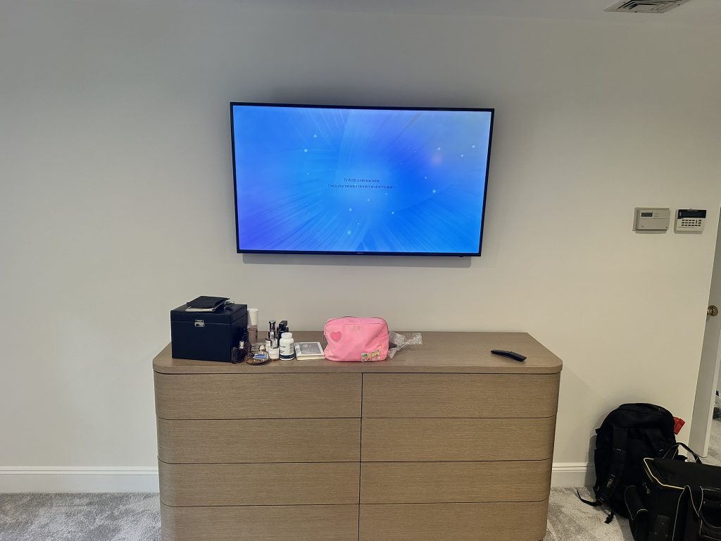 55 inch Samsung TV with full motion mount and hidden in wall wiring in Long Beach, NY