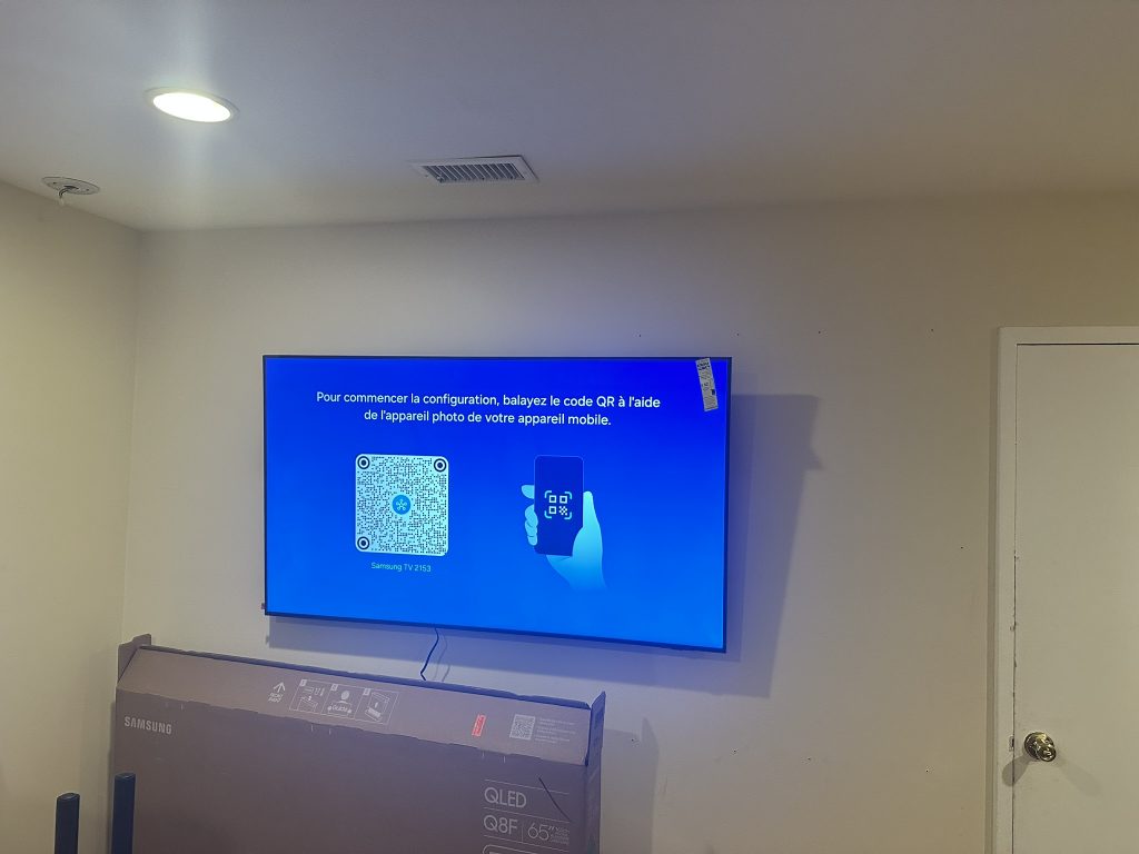 65 inch Samsung QLED tv mounted on wall in East Northport, NY