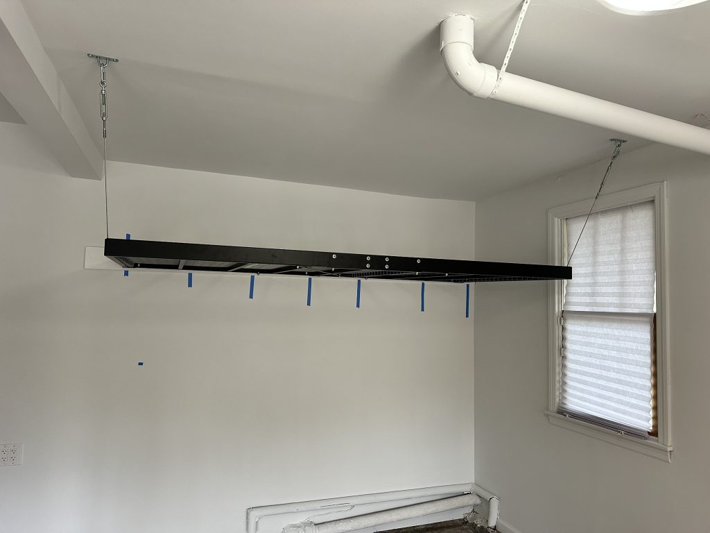 Heavy duty wall mounted shelf for a garage in Garden City, NY