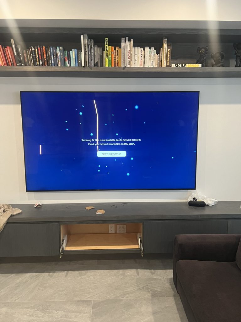 Massive 110 inch Samsung TV mounted by a 3 man team using a heavy duty flat mount in Garden City, NY