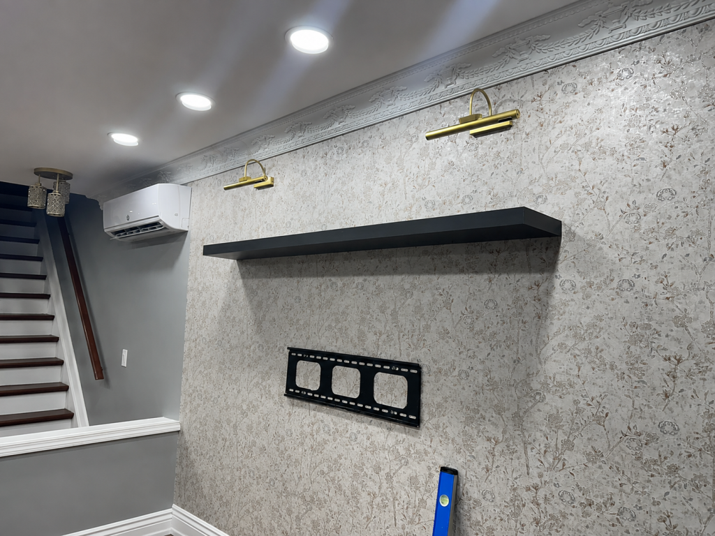 Picture lights floating shelf and TV mount in Massapequa, NY