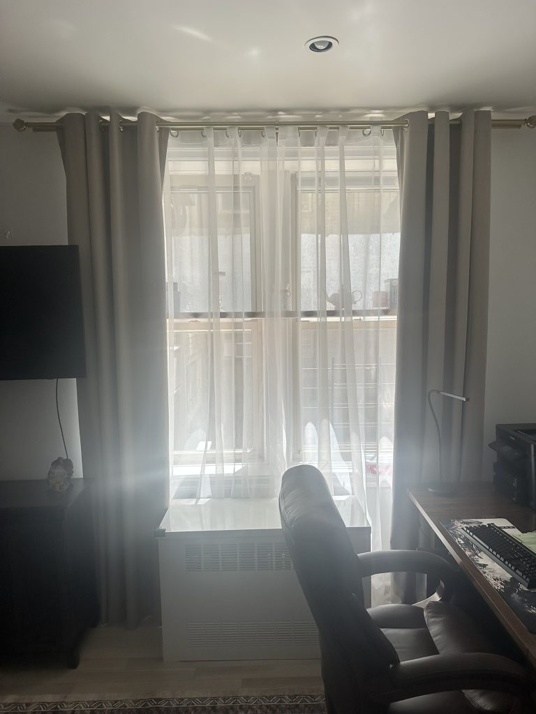 After: Seamless two layer curtain installation with sheer white curtains and light gray drapes in Rockville Centre, NY